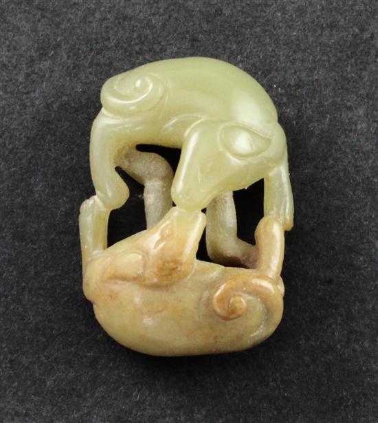 A small Chinese yellow and russet jade group of two hounds, 18th / 19th century, 3.7cm